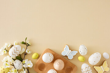 Easter decor concept. Flat lay photo of colorful easter eggs in wooden holder butterfly shaped...