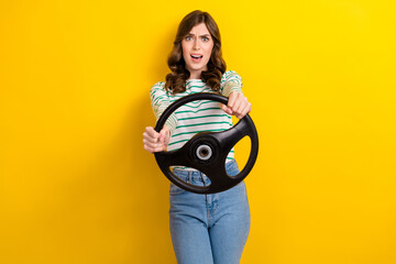 Photo portrait of attractive woman confused fast speed rudder nervous dressed stylish striped look...