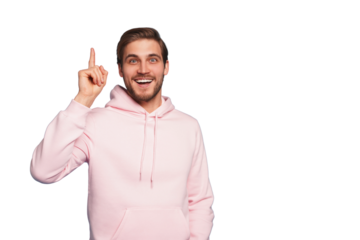 Portrait of an excited happy man pointing finger up at copyspace isolated on a transparent background
