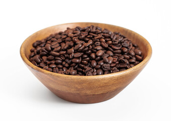 Wooden bowl plate with fresh raw aroma coffee beans on white background.