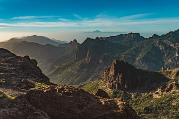View of Rocky Ravine with Tenerife in the Background in Gran Canaria, Spain