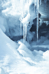 Icicles on the edge of the mountain, closeup