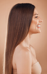 Woman, beauty salon and hair on studio background with healthy shine, glow and keratin aesthetic,...