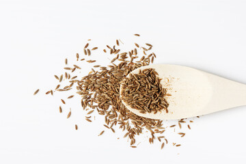 Cumin seeds or zira spice in a spoon.