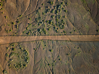 Horizontal top down view of dirt hiking trail in La Isleta, Las Palmas de Gran Canaria, Spain