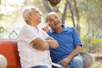 Senior man spending free time at park.