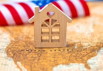 United states of America national flag.r and stars and map and wooden house