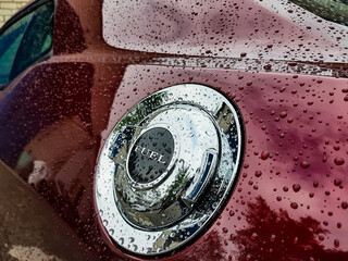Burgundy Car Covered with Raindrops