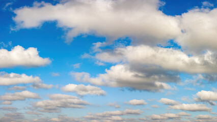 Bright blue sky with white clouds. Background image