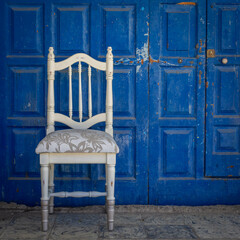 old wooden chair on a wooden wall