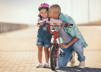 Father, child and kiss while outdoor with a bicycle with a girl learning, development and training...