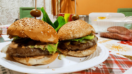 Beautiful homemade burgers on a plate with focus