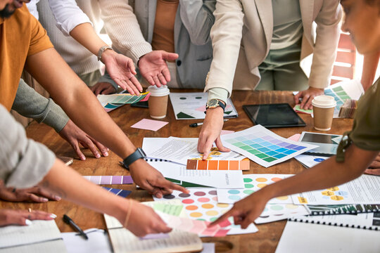 Color choice, creative and hands of business people on desk for branding meeting, strategy and marketing design. Teamwork, collaboration and designers brainstorming ideas, thinking and logo project - Powered by Adobe