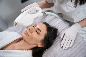Obraz na płótnie Canvas Lady visit cosmetologist, course of treatment for skin