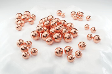 Copper anode balls on white background. Anodes for Plating (3D render)