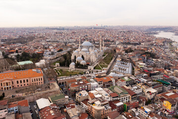 Beautiful view of gorgeous historical Suleymaniye Mosque, Rustem Pasa Mosque and buildings in a cloudy day. Istanbul most popular tourism destination of Turkey. Travel Turkey concept.