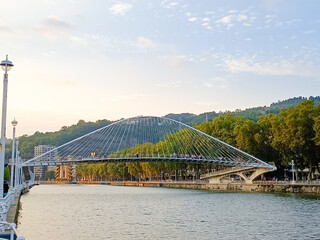 Obraz premium Zubizuri footbridge across Nervion river, Bilbao, Spain