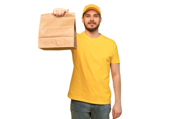 Portrait of delivery man in yellow uniform with paper packet isolated over transparent background