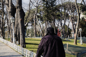 Person walking in the park from kanlica Istanbul, turkey