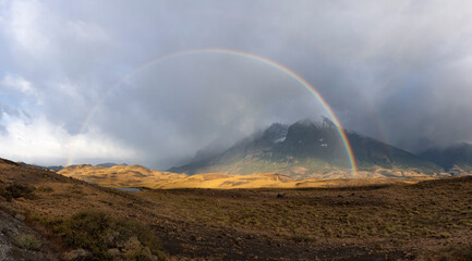 Fototapeta na wymiar Rainbow over Torres del Paine National Park, Chile, South America - Panorama