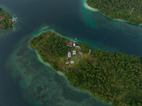 Aerial view of abandoned fish laboratory on Meti Island, Indonesia.