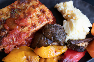 Italian Traditional food, Lasagna, on black background