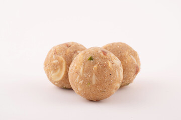 Pinni Ladoo with dry fruits isolated on white background, Gond Laddu Healthy Sweet