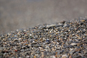 Close up of wet stones on the sea coast