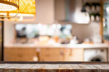 Wood table with blur kitchen room background .For montage product display or design key visual layout.