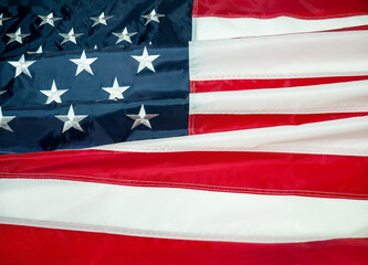 Fototapeta premium American flag of the USA. Independence Day on July 4, Memorial Day, Veterans Day, Labour Day. blur