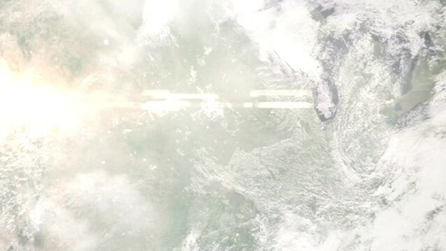 Earth zoom in from outer space to city. Zooming on Clive, Iowa, USA. The animation continues by zoom out through clouds and atmosphere into space. Images from NASA