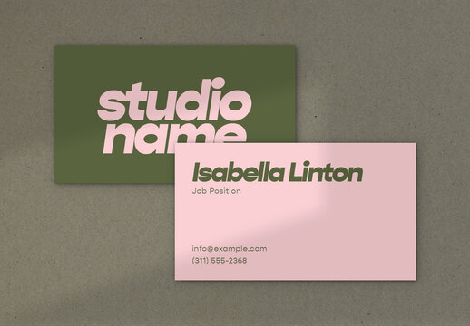 Simple Business Card Layout with Green and Pink Accents
