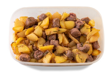 Sausage stew with baked potatoes in plastic food tray