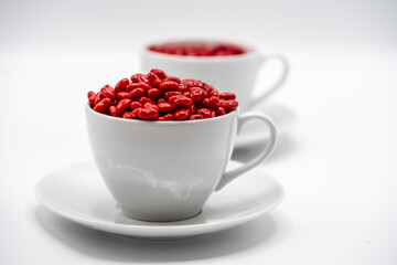 Cinnamon mini hearts in the shape of heart with  two coffee cups