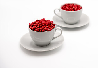 Cinnamon mini hearts in the shape of heart with  two coffee cups