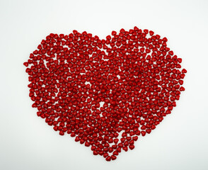 Fototapeta na wymiar Cinnamon mini hearts in the shape of heart