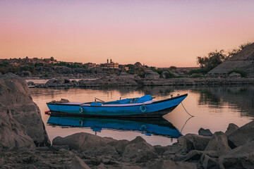 Fishing boat on the bank of the Nile river in Aswan, Egypt	
