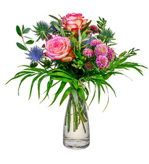 Isolated flower arrangement in a glass vase - 579833966