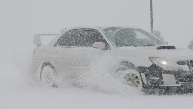 drifting car in snow
