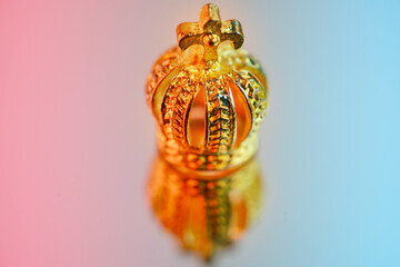close up metal gold, bronze crown on mirror surface, concept supreme power, victory, symbol...