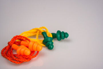 Earplugs, earmuffs, or ear protectors.