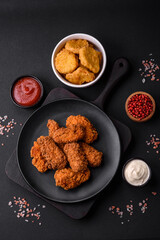 Delicious crispy breaded chicken wings grilled with spices and herbs
