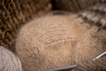 Hand knitting, heel at woolen sock