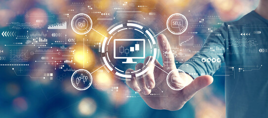 Stock trading theme with man on blurred blue city light background