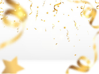 Golden confetti falls on a beautiful background. Falling streamers on stage.
