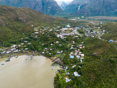 Drone view of Caleta Tortel with its small cabins - Discovering the beautiful village while traveling the Carretera Austral in Patagonia, Chile 