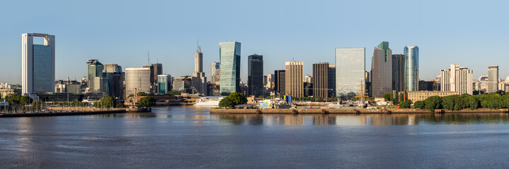 Wide panorama of the city skyline at the entrance to the port
