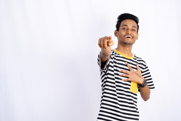 The man pointing finger at the camera and laughing hand on the chest isolated on white background