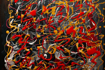 Acrylic paint yellow and red strokes fresh wet waves lines drawing art background texture