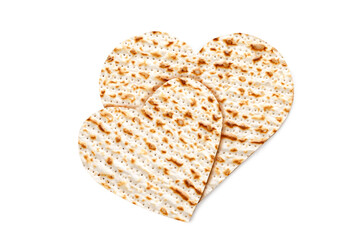 Matzah in the form of a heart. Pesach celebration concept (jewish Passover holiday)